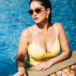 Sunny Leone's new photoshoot at the swimming pool, with stylish outfit and sun glasses