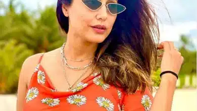 Hina Khan at beach taking sunbath View Photos