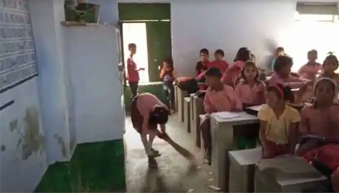 Children are doing brooms in Primary School of Rawal Hardoi