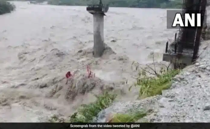 Under construction bridge washed away amid floods in Uttarakhand