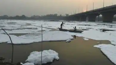 Barricades, boats, water sprinkling to keep away the toxic foam of Yamuna