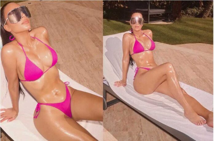 Kim Kardashian viral pics of sunbathing in pink bikini