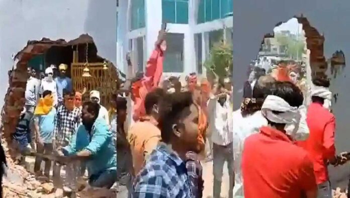 Hindu organizations broke the wall in front of the temple at Katni railway station