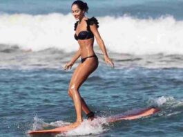 Lisa Haydon surf in Black Swimsuit