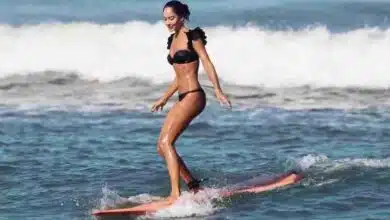 Lisa Haydon surf in Black Swimsuit
