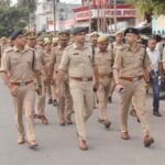 Amroha DIG took out flag march in Gajraula