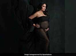 Bipasha Basu flaunts baby bump in a black dress