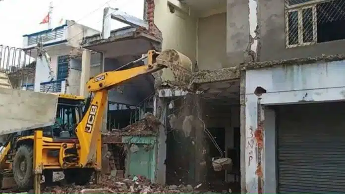 Bulldozer on encroachment near Amethi Overbridge