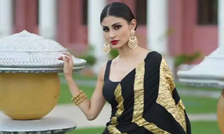 Mouni Roy in a classic black sari during Brahmastra promotions