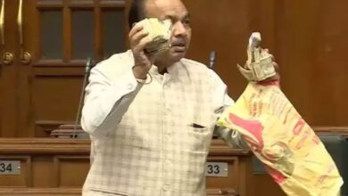 AAP MLA shows bundles of cash in Delhi Assembly