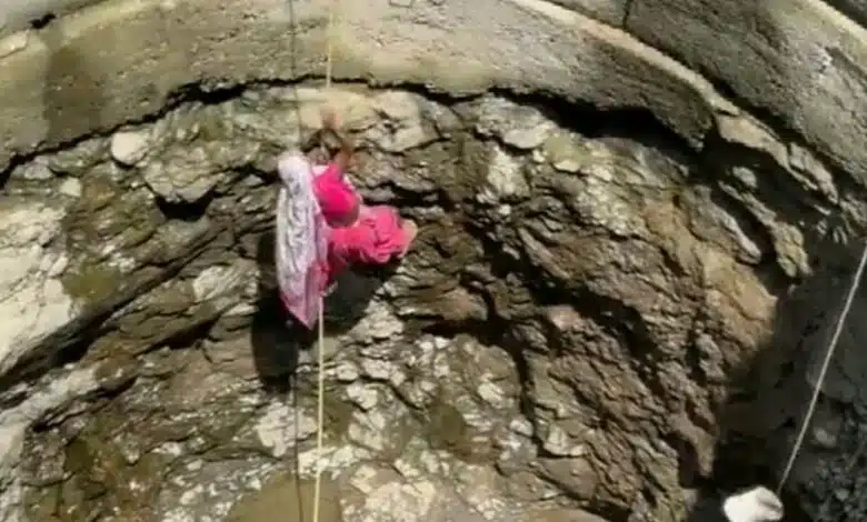 Villagers suffering from water crisis forced to descend into wells