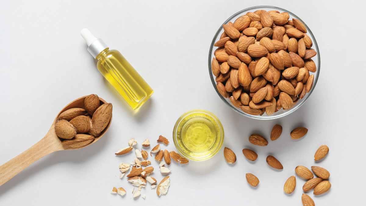 How does eating almonds help in building the body