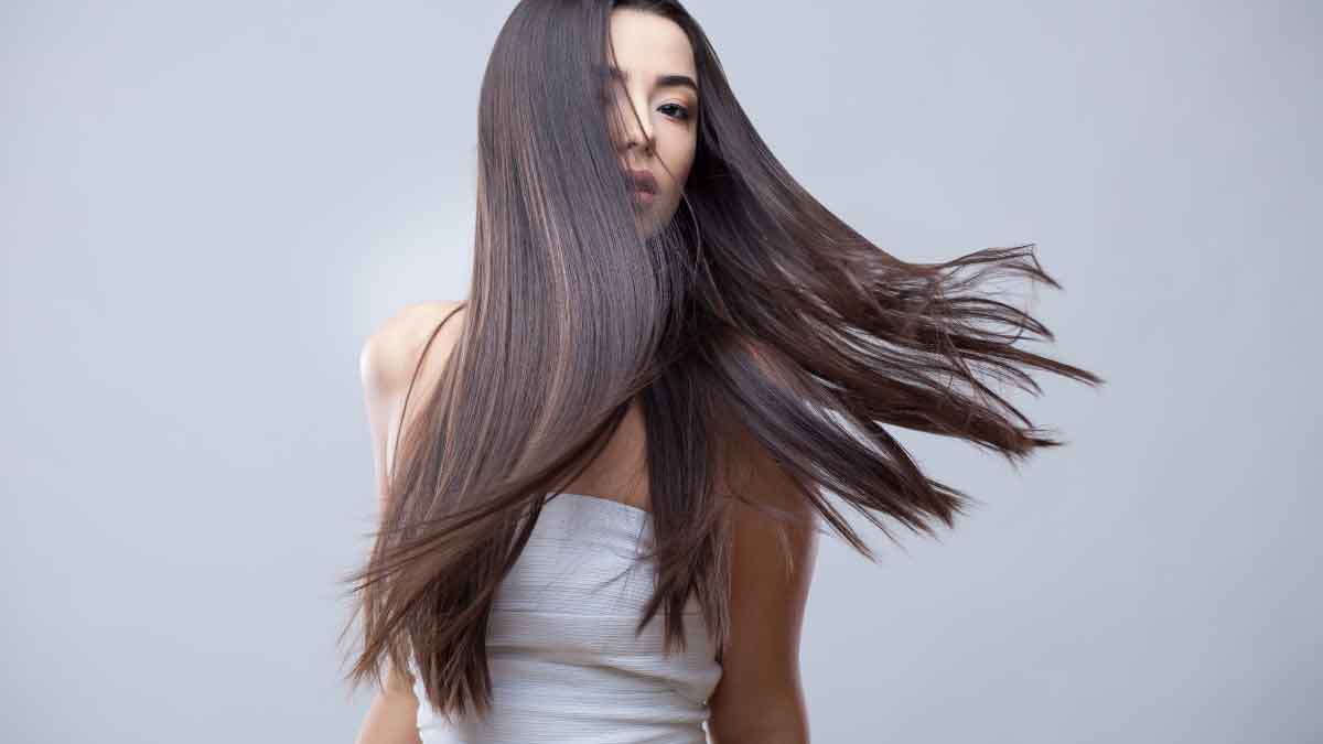 How to apply coconut oil for knee-length hair