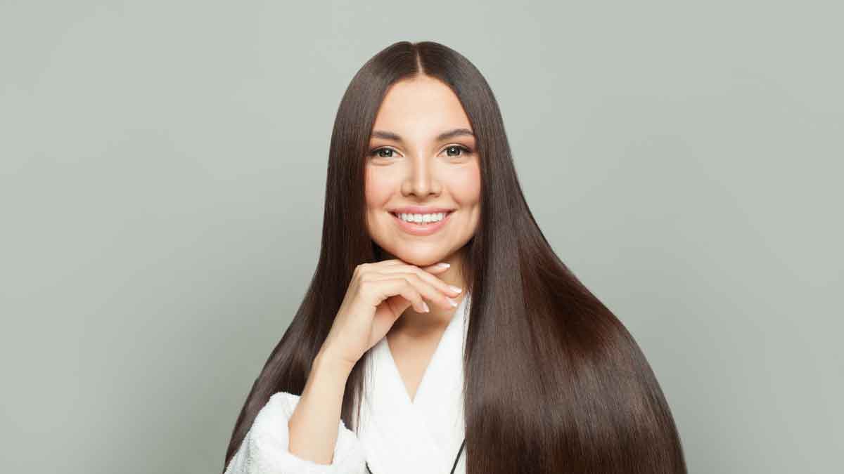 How to apply coconut oil for knee-length hair