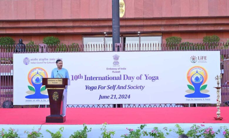 Indians in Kuwait pay tribute to fire tragedy victims during Yoga Day event