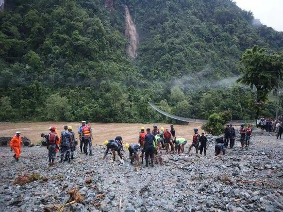 Two passenger buses swept away in a landslide in Nepal