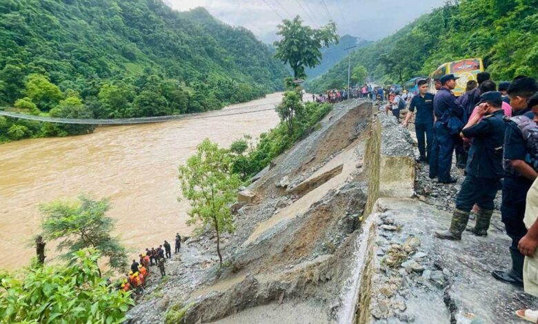 Two passenger buses swept away in a landslide in Nepal
