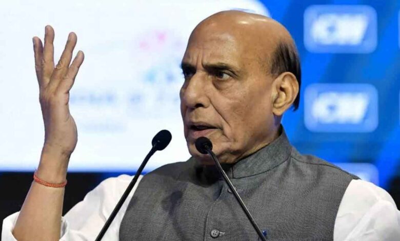What advice did Rajnath Singh give to the NRIs working in America?