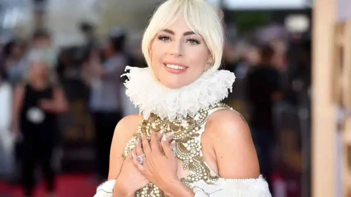 Lady Gaga in voluminous Dior gown and dramatic headpiece takes over the red carpet