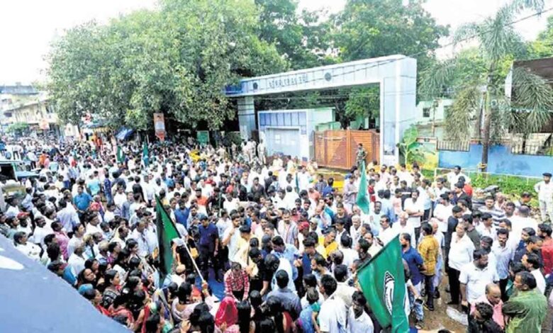 Odisha BJD workers demonstrated in front of Raj Bhavan over the attack on the fiancée of an army soldier