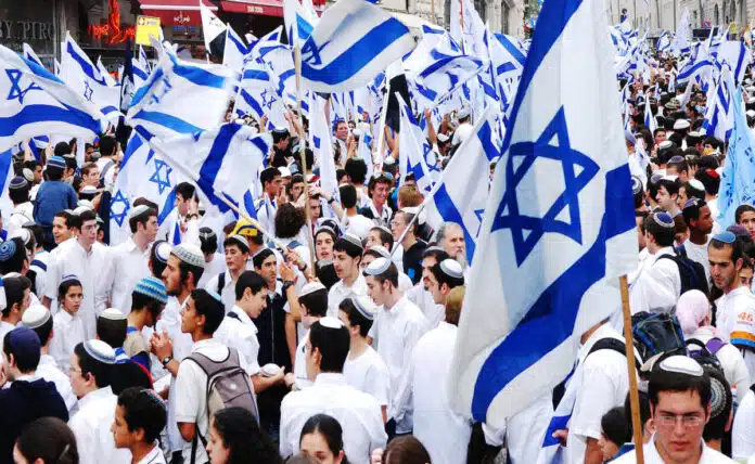 Israel celebrates Jewish holiday for first time since 1973 amid multi-front war