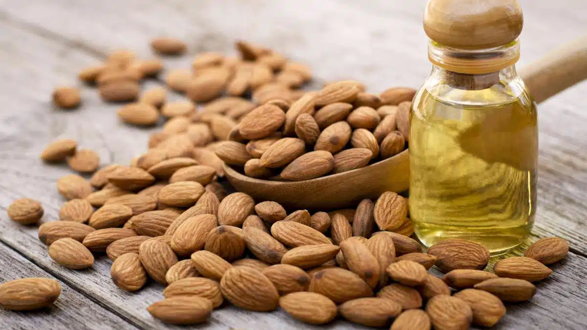 What are the benefits of applying almond oil?