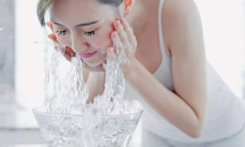 How many times a day should one Face Wash so that the face does not feel dry and sticky?