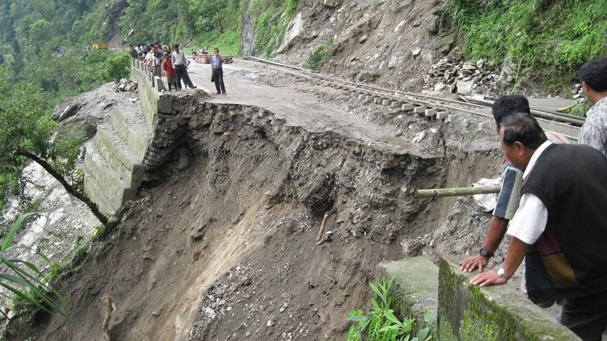 Heavy rains in Darjeeling trigger landslides, killing seven people, blocking roads, and collapsing an iron bridge.
