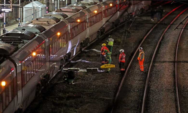 Several people were stabbed on a London-bound train in the UK; two suspects arrested.