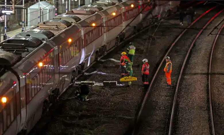 Several people were stabbed on a London-bound train in the UK; two suspects arrested.