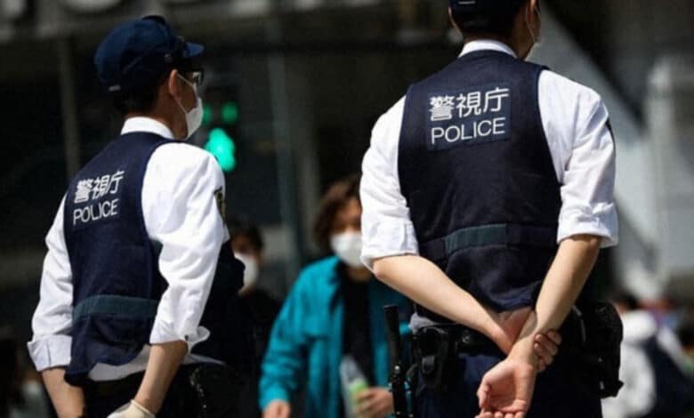At least 14 people were injured in a stabbing and liquid spray attack at a factory in Japan; the suspect has been arrested.