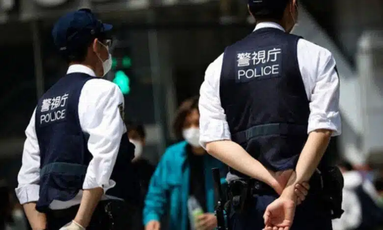 At least 14 people were injured in a stabbing and liquid spray attack at a factory in Japan; the suspect has been arrested.
