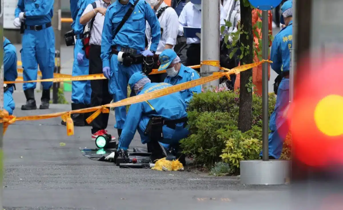 At least 14 people were injured in a stabbing and liquid spray attack at a factory in Japan; the suspect has been arrested.