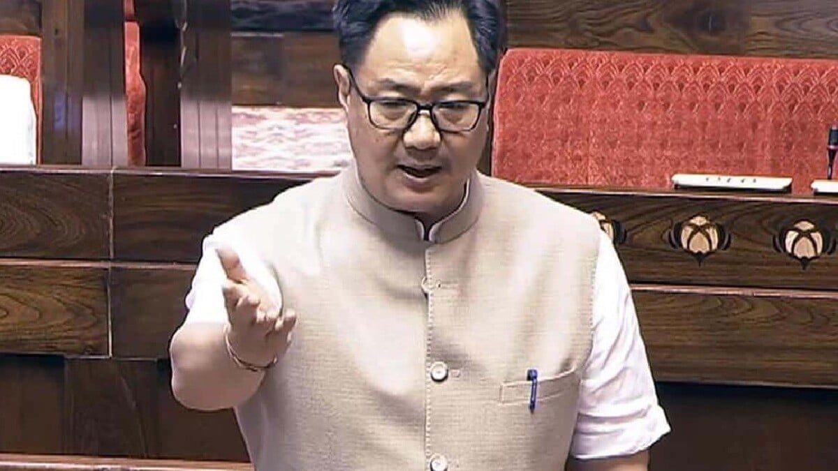 What message did Kiren Rijiju convey to the candidate regarding the exam bill